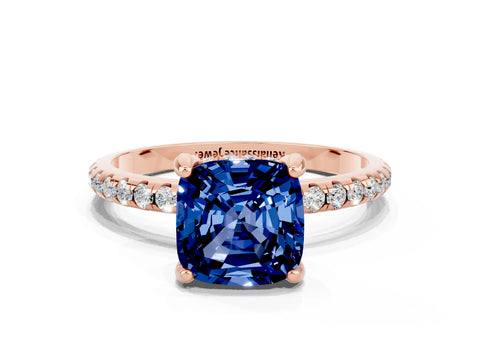 Rose gold Cushion Cut Diamond Solitaire Ring with Four-Prong Setting and Pavé Band