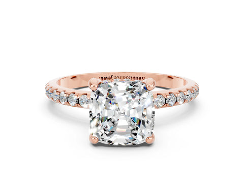 Rose gold Cushion Cut Diamond Solitaire Ring with Four-Prong Setting and Pavé Band