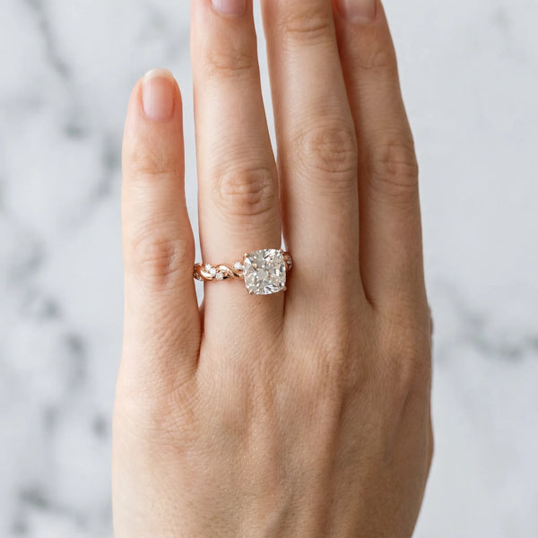 Rose gold Cushion Cut Diamond Solitaire Ring with Twisted Band and Pavé Accents