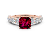 Rose gold Cushion Cut Garnet Prong Setting with Side Stones on a Pave Band