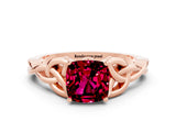 Rose gold Cushion Cut Garnet Solitaire Engagement Ring with Celtic Knot Band and Four-Prong Setting