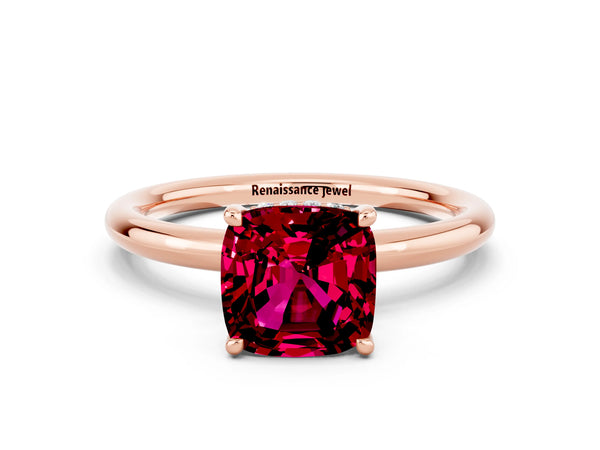 Rose gold Cushion Cut Garnet Solitaire Ring with Thin Band and Four-Prong Setting