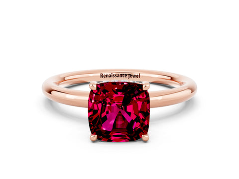 Rose gold Cushion Cut Garnet Solitaire Ring with Thin Band and Four-Prong Setting