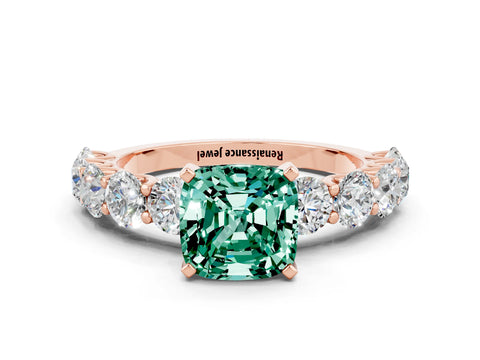 Rose gold Cushion Cut Green Sapphire Prong Setting with Side Stones on a Pave Band