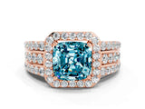 Rose gold Cushion Cut Halo Blue Topaz Ring with Split Shank and Four-Prong Setting