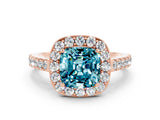 Rose gold Cushion Cut Halo Diamond Ring with Pavé Band and Three-Prong Setting