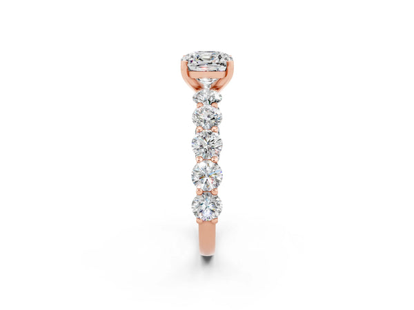 Rose gold Cushion Cut Moissanite Prong Setting with Side Stones on a Pave Band