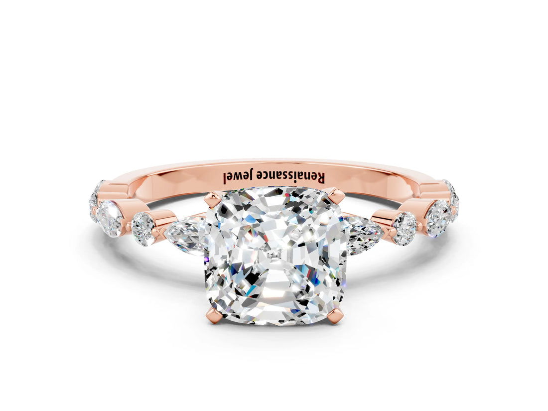 Rose gold Cushion Cut Moissanite Solitaire with Side Stones on a Pavé Band and Four-Prong Setting