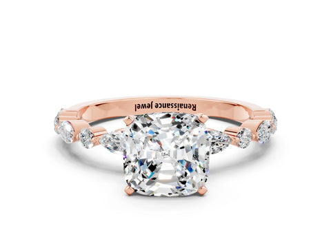 Rose gold Cushion Cut Moissanite Solitaire with Side Stones on a Pavé Band and Four-Prong Setting