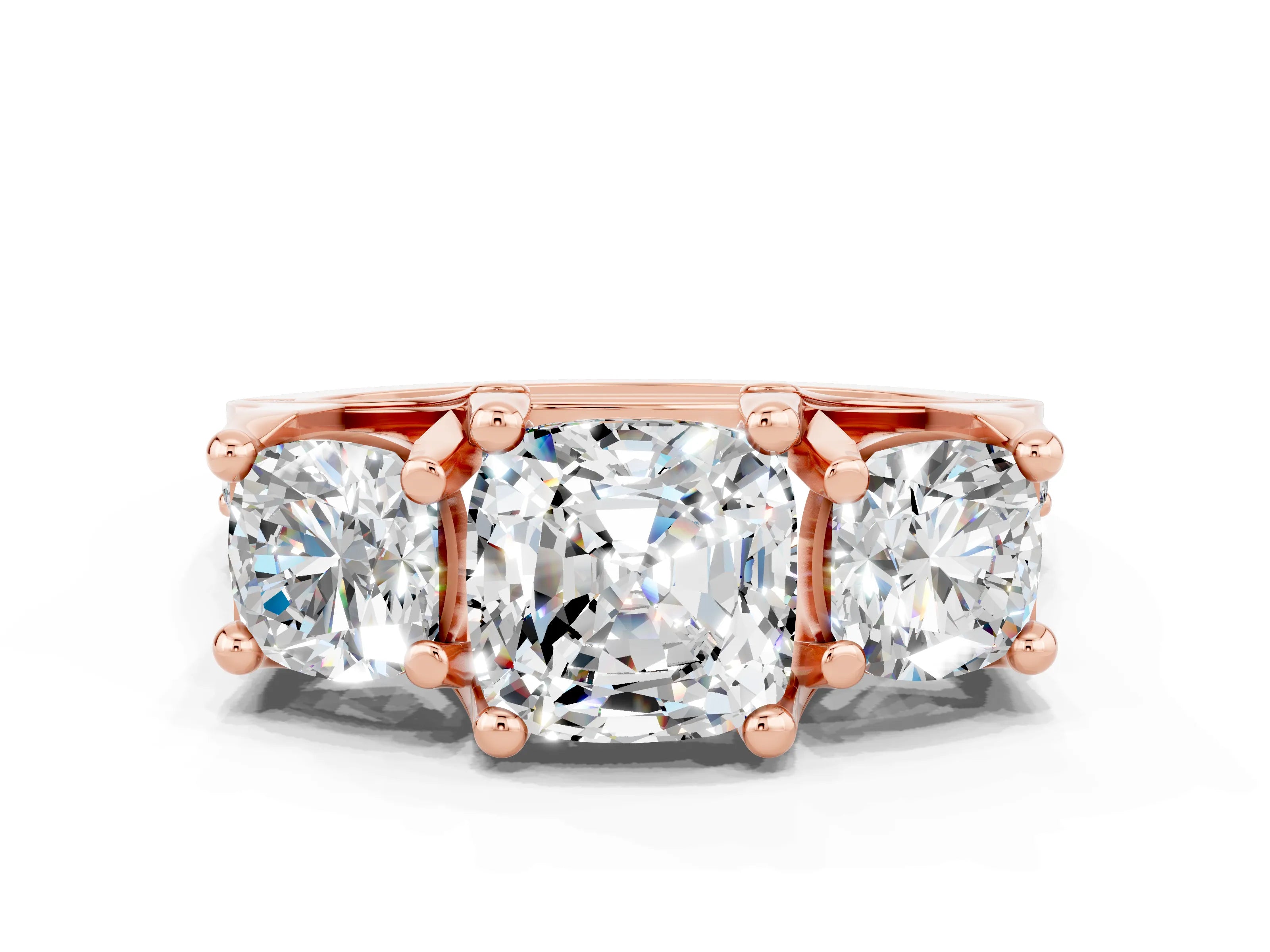 Rose gold Cushion Cut Moissanite Three-Stone Ring with Channel Set Band and Four-Prong Setting