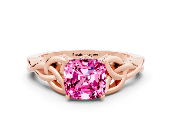 Rose gold Cushion Cut Pink Sapphire Solitaire Engagement Ring with Celtic Knot Band and Four-Prong Setting