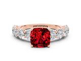 Rose gold Cushion Cut Ruby Prong Setting with Side Stones on a Pave Band