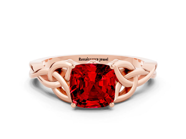 Rose gold Cushion Cut Ruby Solitaire Engagement Ring with Celtic Knot Band and Four-Prong Setting