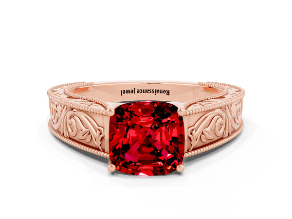 Rose gold Cushion Cut Ruby Solitaire Ring with Engraved Band and Four-Prong Setting