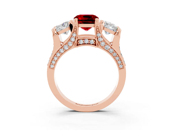 Rose gold Cushion Cut Ruby Three-Stone Ring with Channel Set Band and Four-Prong Setting