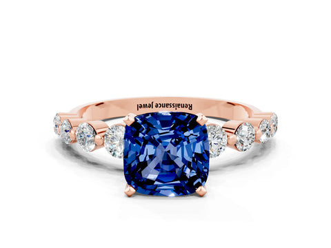 Rose gold Cushion Cut Solitaire Blue Sapphire Ring with Pave Band and Four-Prong Setting