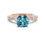 Rose gold Cushion Cut Solitaire Blue Topaz Ring with Pave Band and Four-Prong Setting