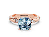 Rose gold Cushion Cut Solitaire Diamond Engagement Ring with Twisted Pave Band and Four-Prong Setting