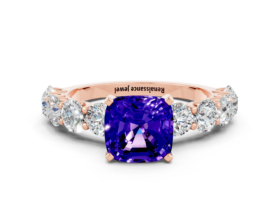 Rose gold Cushion Cut Tanzanite Prong Setting with Side Stones on a Pave Band
