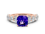 Rose gold Cushion Cut Tanzanite Prong Setting with Side Stones on a Pave Band