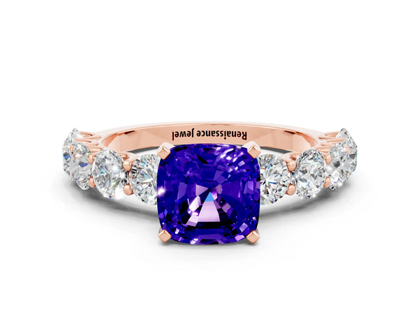 Rose gold Cushion Cut Tanzanite Prong Setting with Side Stones on a Pave Band