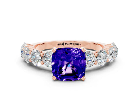Rose gold Cushion Cut Tanzanite Prong Setting with Side Stones on a Pave Band