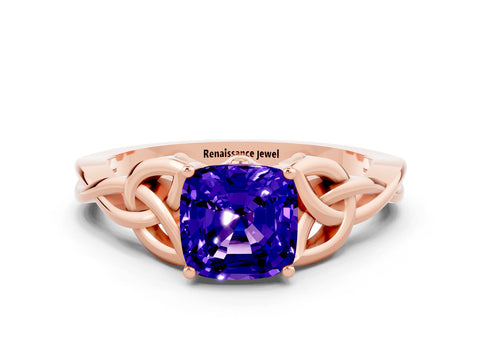 Rose gold Cushion Cut Tanzanite Solitaire Engagement Ring with Celtic Knot Band and Four-Prong Setting