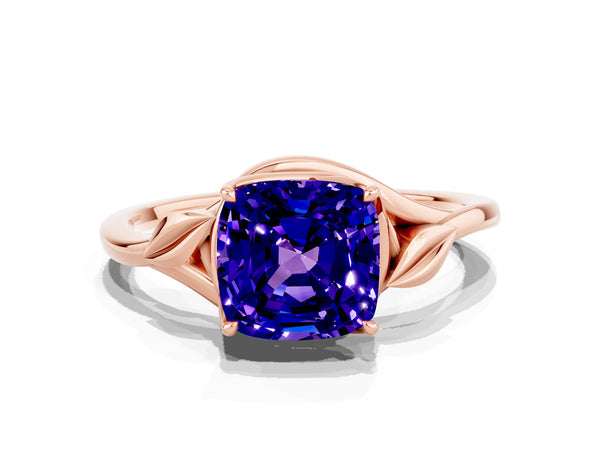 Rose gold Cushion Cut Tanzanite Solitaire Ring with Twist Band and Four-Prong Setting