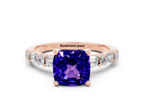 Rose gold Cushion Cut Tanzanite Solitaire with Side Baguettes and Channel Set Band