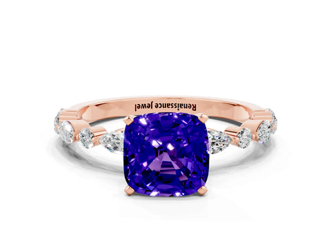 Rose gold Cushion Cut Tanzanite Solitaire with Side Stones on a Pavé Band and Four-Prong Setting