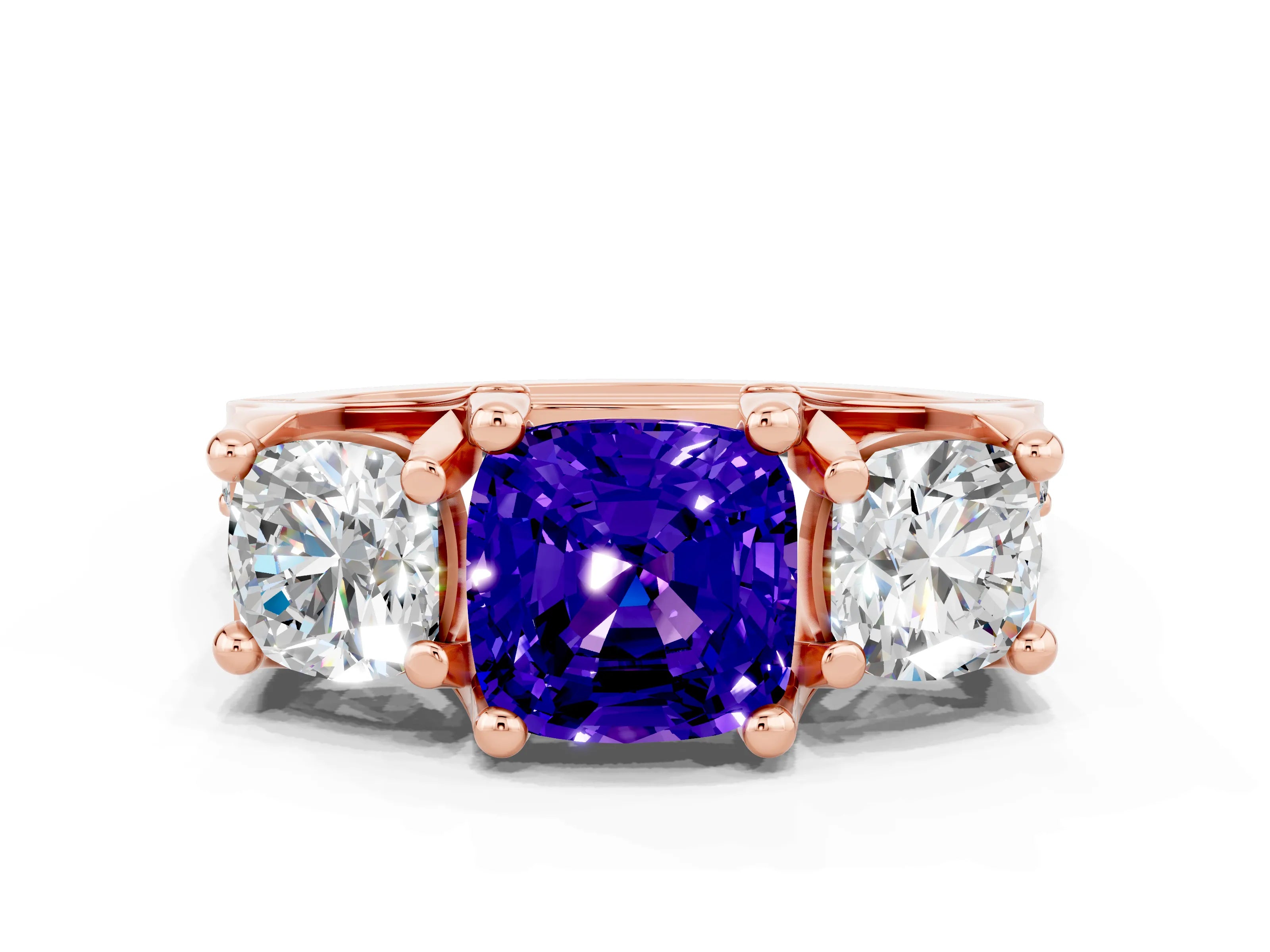 Rose gold Cushion Cut Tanzanite Three-Stone Ring with Channel Set Band and Four-Prong Setting