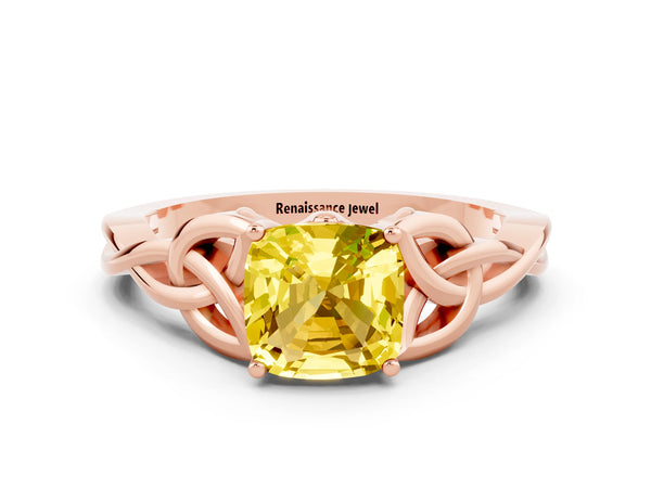 Rose gold Cushion Cut Yellow Sapphire Solitaire Engagement Ring with Celtic Knot Band and Four-Prong Setting