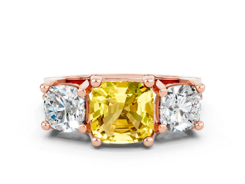 Rose gold Cushion Cut Yellow Sapphire Three-Stone Ring with Channel Set Band and Four-Prong Setting