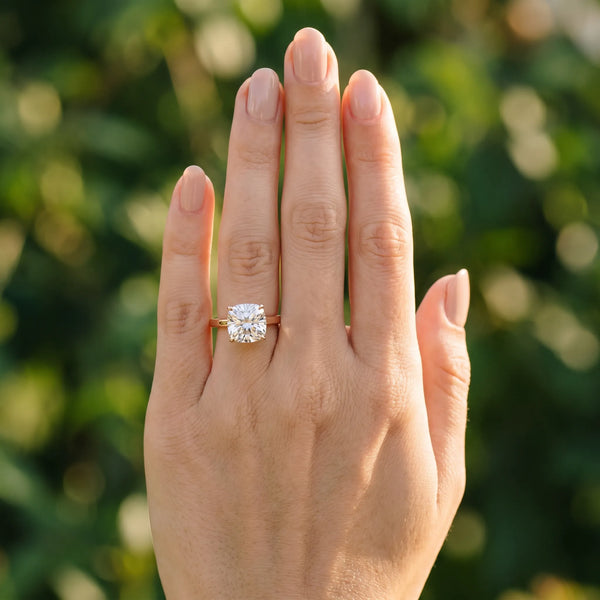 Rose gold Cushion Solitaire Diamond Ring with Four-Prong Setting and Classic Band