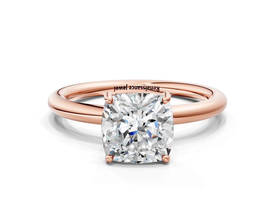 Rose gold Cushion Solitaire Diamond Ring with Four-Prong Setting on a Plain Band