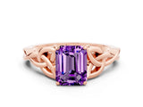Rose gold Emerald Cut Amethyst Solitaire Engagement Ring with Celtic Knot Band and Four-Prong Setting