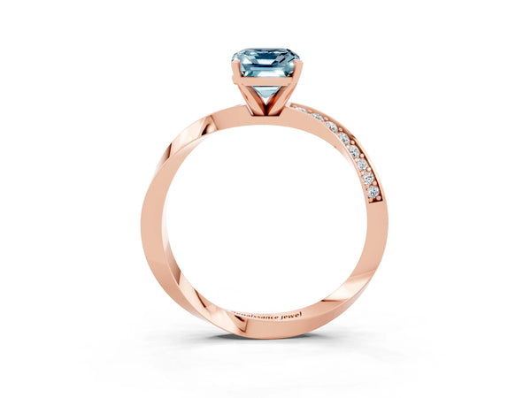 Rose gold Emerald Cut Aquamarine Engagement Ring with Side Stone Accents and Four-Prong Setting