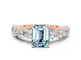 Rose gold Emerald Cut Aquamarine Prong Setting with Side Stones on a Pave Band