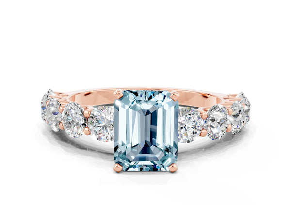 Rose gold Emerald Cut Aquamarine Prong Setting with Side Stones on a Pave Band