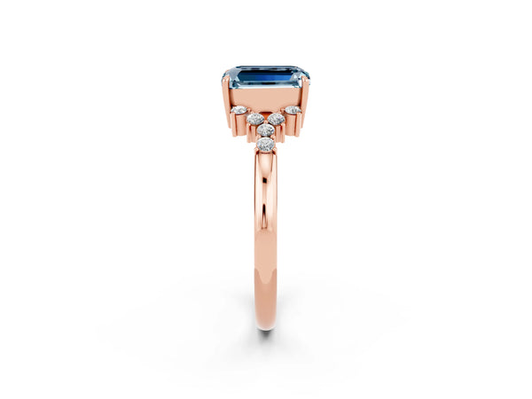 Rose gold Emerald Cut Aquamarine Ring with Side Stones and Four-Prong Setting