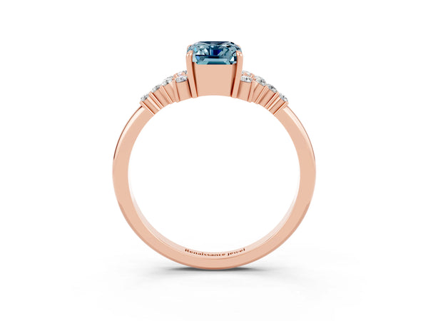 Rose gold Emerald Cut Aquamarine Ring with Side Stones and Four-Prong Setting