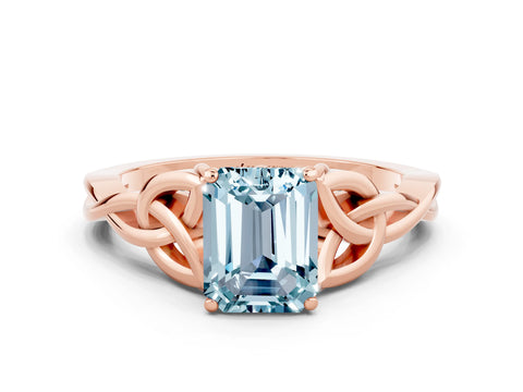 Rose gold Emerald Cut Aquamarine Solitaire Engagement Ring with Celtic Knot Band and Four-Prong Setting