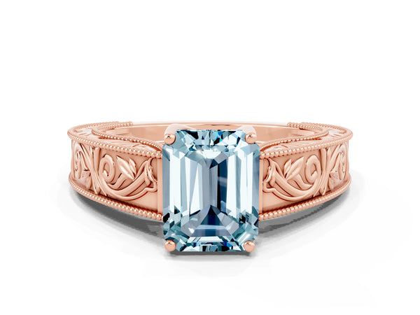 Rose gold Emerald Cut Aquamarine Solitaire Ring with Engraved Band and Four-Prong Setting