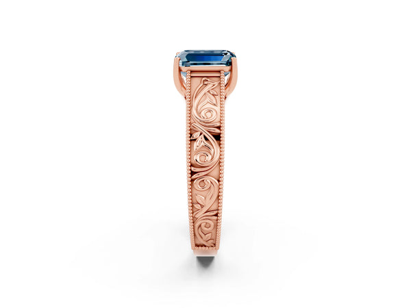 Rose gold Emerald Cut Aquamarine Solitaire Ring with Engraved Band and Four-Prong Setting