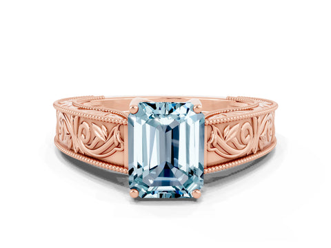 Rose gold Emerald Cut Aquamarine Solitaire Ring with Engraved Band and Four-Prong Setting