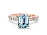 Rose gold Emerald Cut Aquamarine Solitaire Ring with Pavé Accents and Four-Prong Setting