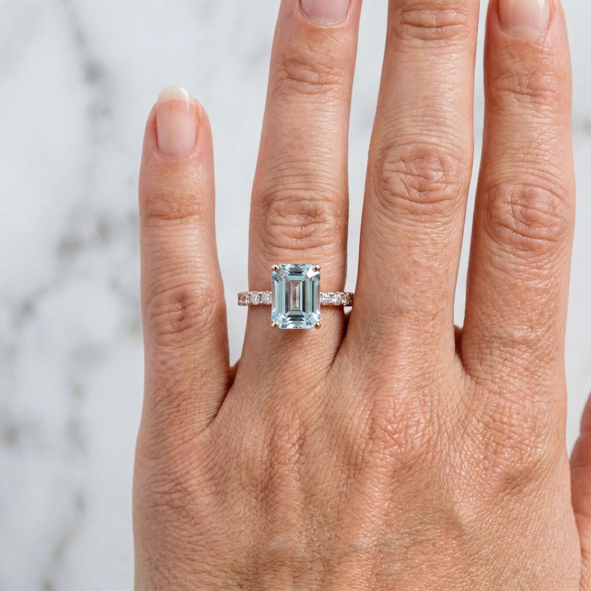 Rose gold Emerald Cut Aquamarine Solitaire Ring with Round  Pavé Band and Four-Prong Setting_42