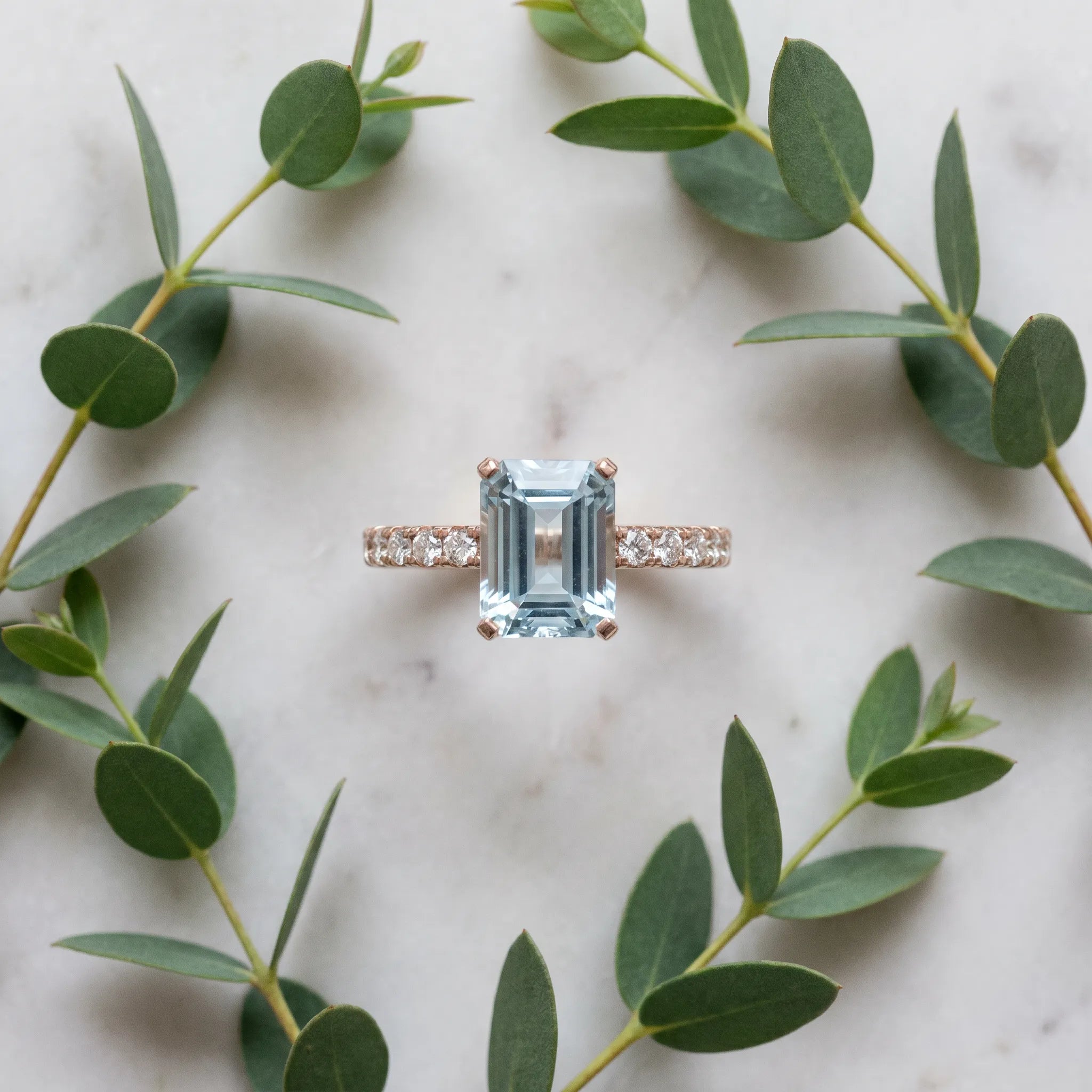 Rose gold Emerald Cut Aquamarine Solitaire Ring with Round  Pavé Band and Four-Prong Setting_45