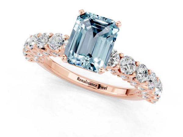 Rose gold Emerald Cut Aquamarine Solitaire Ring with Shared Prong Pavé Band and Four-Prong Setting