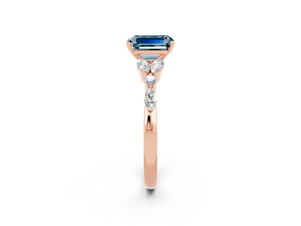 Rose gold Emerald Cut Aquamarine Solitaire Ring with Side Stones and Four-Prong Setting